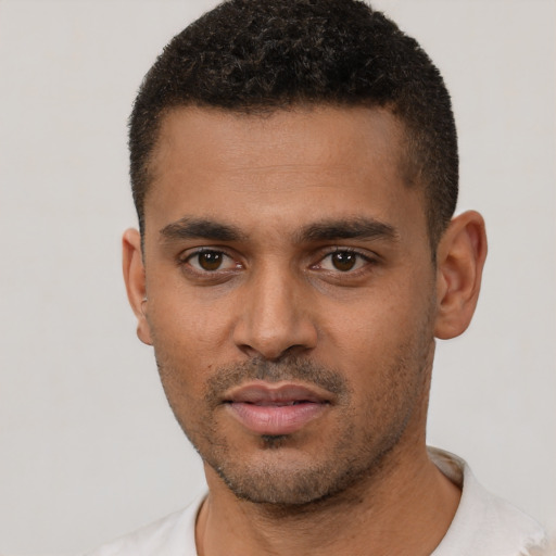 Neutral black young-adult male with short  black hair and brown eyes