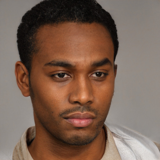 Neutral latino young-adult male with short  brown hair and brown eyes