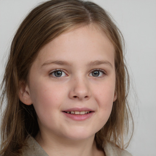 Joyful white child female with medium  brown hair and brown eyes