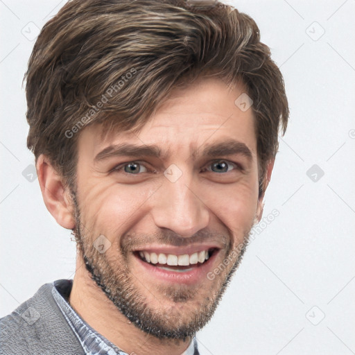 Joyful white adult male with short  brown hair and grey eyes