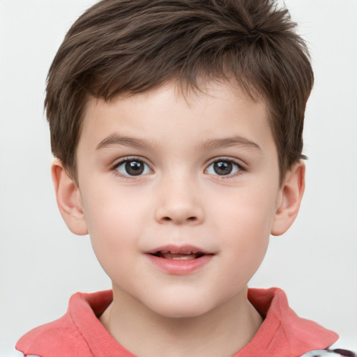 Joyful white child male with short  brown hair and brown eyes