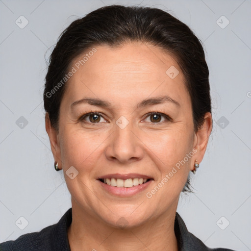 Joyful white adult female with medium  brown hair and brown eyes