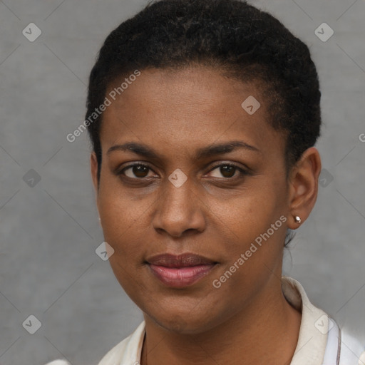 Joyful black young-adult female with short  brown hair and brown eyes