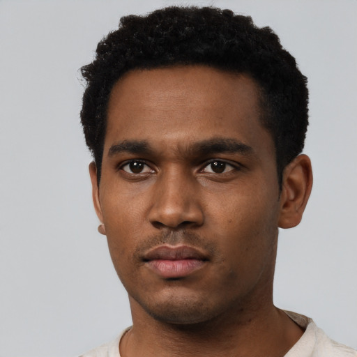Neutral black young-adult male with short  black hair and brown eyes