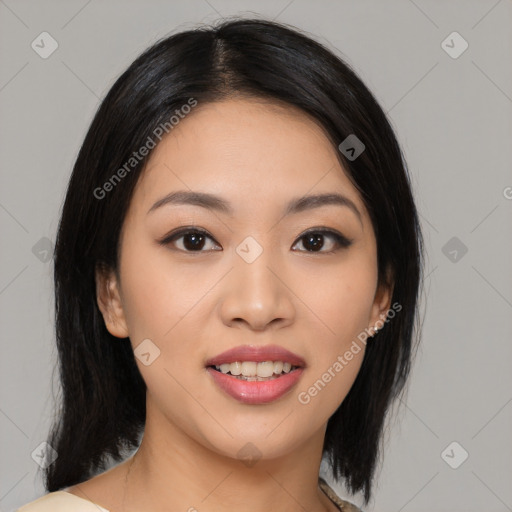 Joyful asian young-adult female with medium  black hair and brown eyes