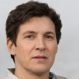 Neutral white adult male with short  brown hair and brown eyes