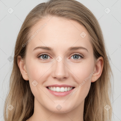 Joyful white young-adult female with long  brown hair and grey eyes