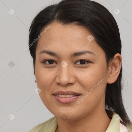 Joyful asian young-adult female with medium  brown hair and brown eyes