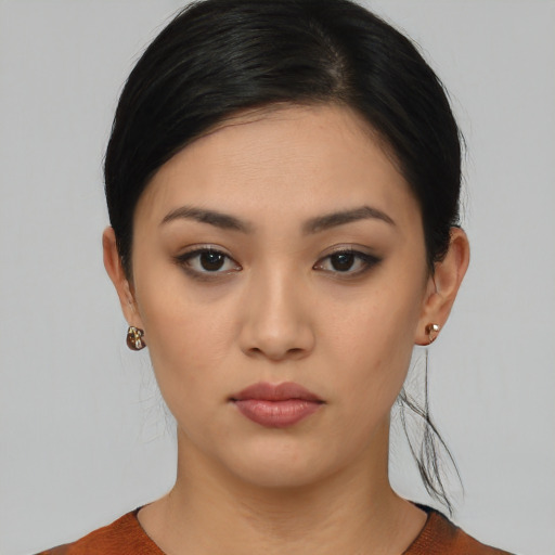 Neutral asian young-adult female with medium  black hair and brown eyes