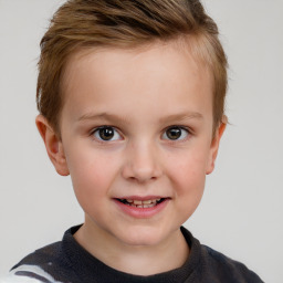 Joyful white child female with short  brown hair and brown eyes