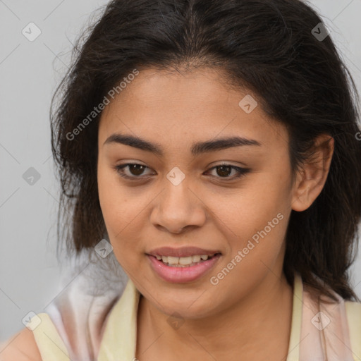 Joyful latino young-adult female with medium  brown hair and brown eyes