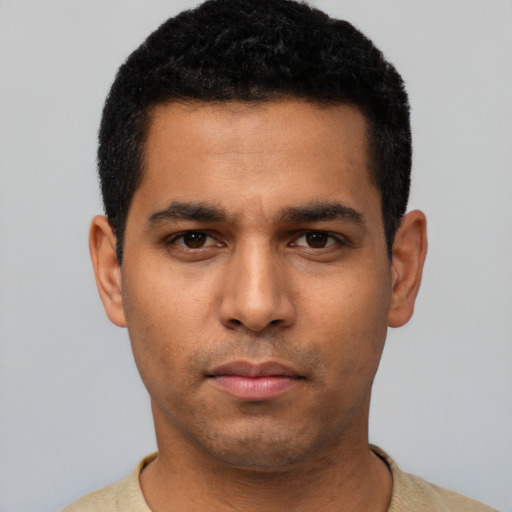 Neutral latino young-adult male with short  black hair and brown eyes