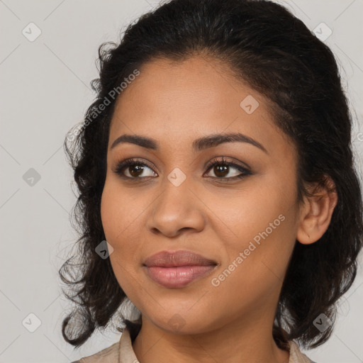 Joyful latino young-adult female with medium  brown hair and brown eyes