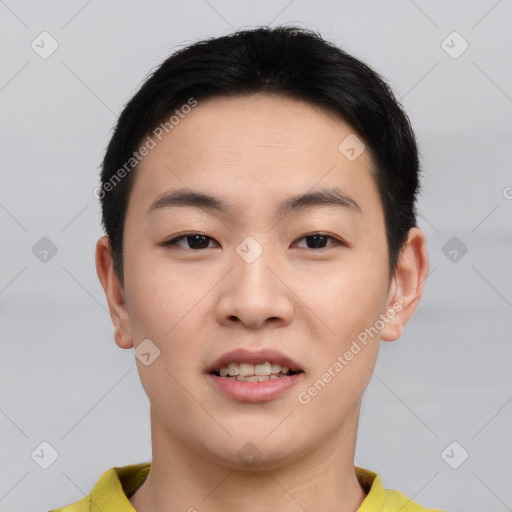 Joyful asian young-adult male with short  black hair and brown eyes