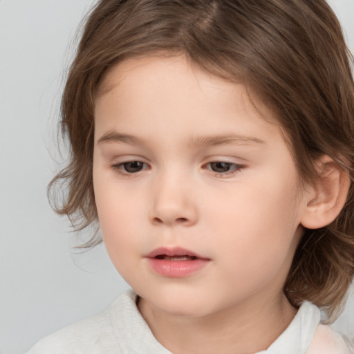 Neutral white child female with medium  brown hair and brown eyes