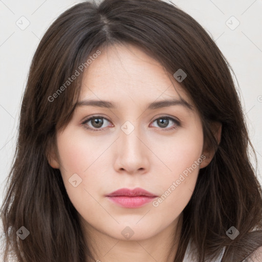 Neutral white young-adult female with long  brown hair and brown eyes