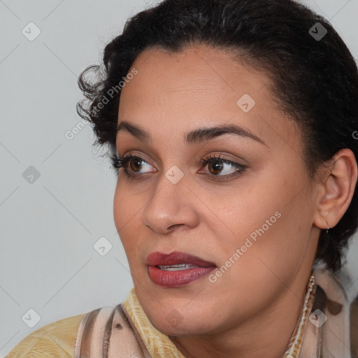 Joyful latino young-adult female with short  brown hair and brown eyes