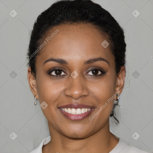 Joyful black young-adult female with short  brown hair and brown eyes