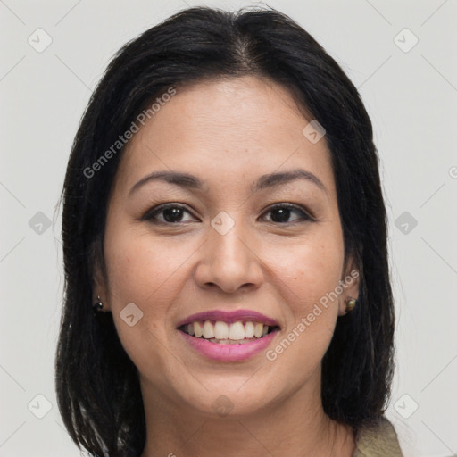 Joyful latino young-adult female with long  brown hair and brown eyes