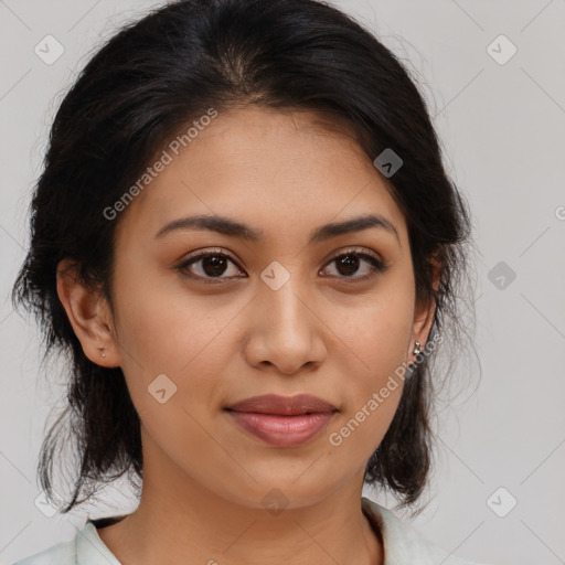 Joyful latino young-adult female with medium  brown hair and brown eyes