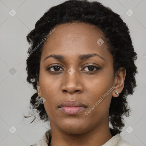 Neutral black young-adult female with short  black hair and brown eyes