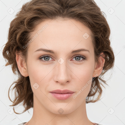 Joyful white young-adult female with medium  brown hair and green eyes