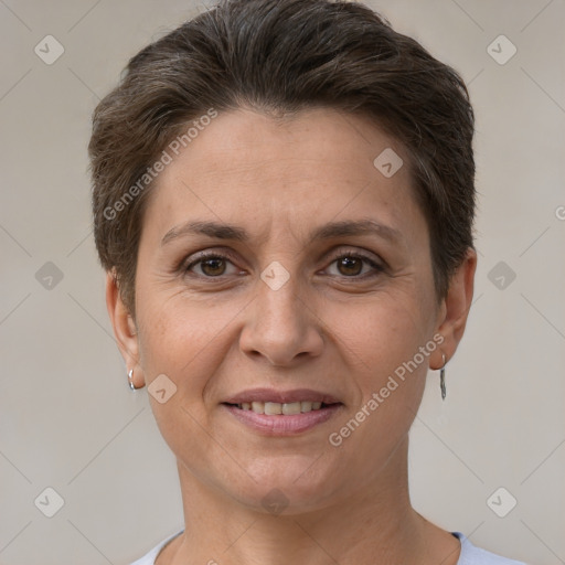 Joyful white adult female with short  brown hair and brown eyes