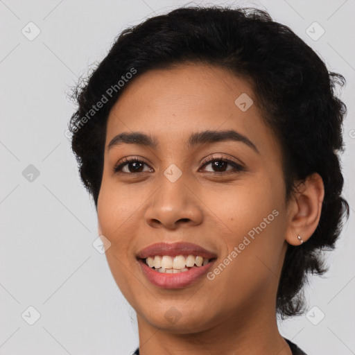 Joyful latino young-adult female with medium  black hair and brown eyes