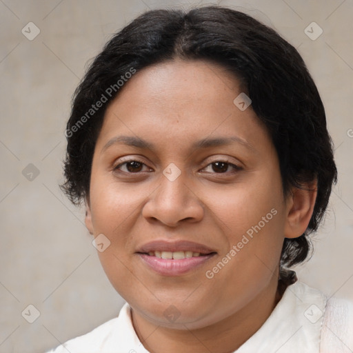 Joyful latino adult female with medium  brown hair and brown eyes