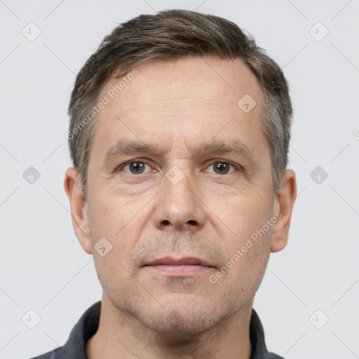 Neutral white adult male with short  brown hair and brown eyes