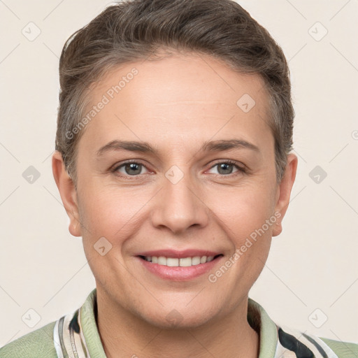 Joyful white young-adult female with short  brown hair and grey eyes