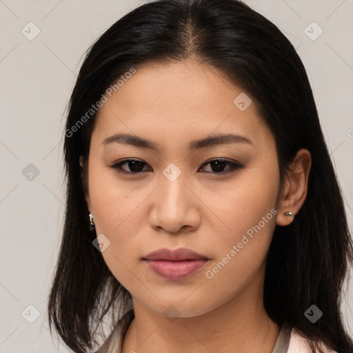 Joyful asian young-adult female with long  brown hair and brown eyes