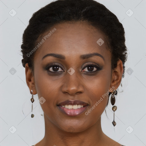 Joyful black young-adult female with long  brown hair and brown eyes
