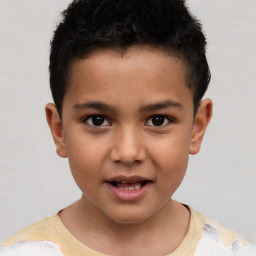 Joyful white child male with short  brown hair and brown eyes