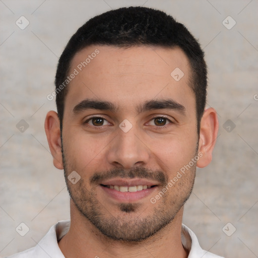 Joyful white young-adult male with short  black hair and brown eyes