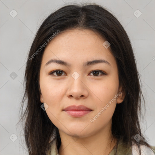 Joyful latino young-adult female with long  brown hair and brown eyes