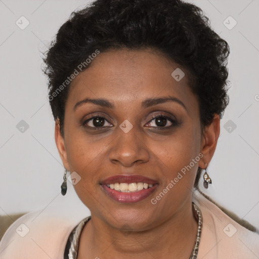 Joyful black young-adult female with short  brown hair and brown eyes