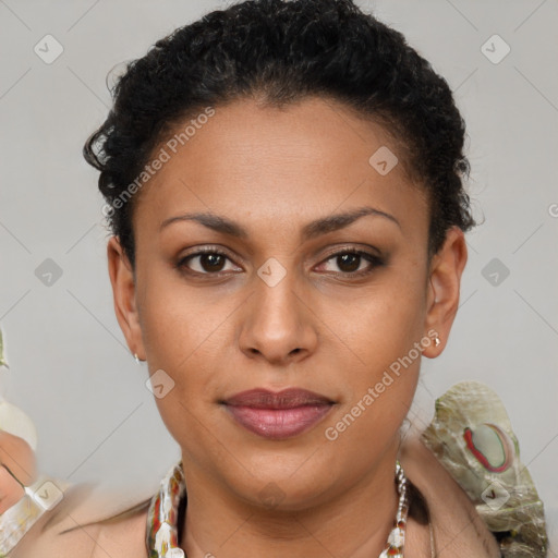 Joyful latino young-adult female with short  brown hair and brown eyes