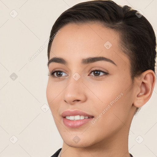 Joyful white young-adult female with short  brown hair and brown eyes