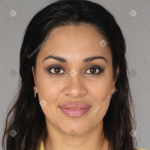 Joyful black young-adult female with long  brown hair and brown eyes