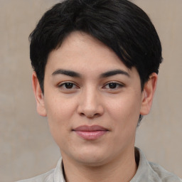 Joyful asian young-adult female with short  black hair and brown eyes