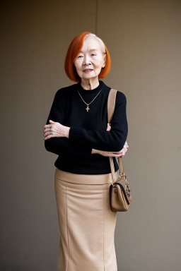 Elderly female with  ginger hair