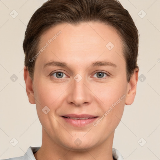 Joyful white young-adult female with short  brown hair and grey eyes