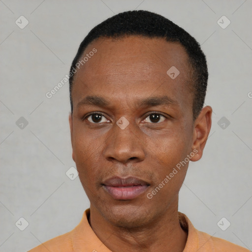 Neutral black adult male with short  black hair and brown eyes