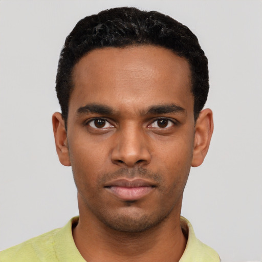 Neutral black young-adult male with short  black hair and brown eyes