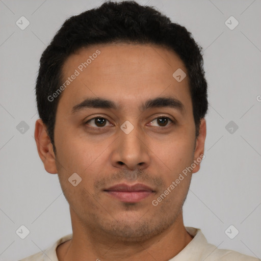 Neutral latino young-adult male with short  black hair and brown eyes