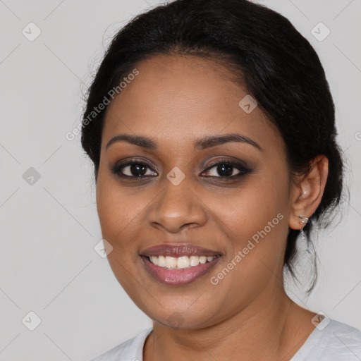 Joyful black young-adult female with medium  brown hair and brown eyes