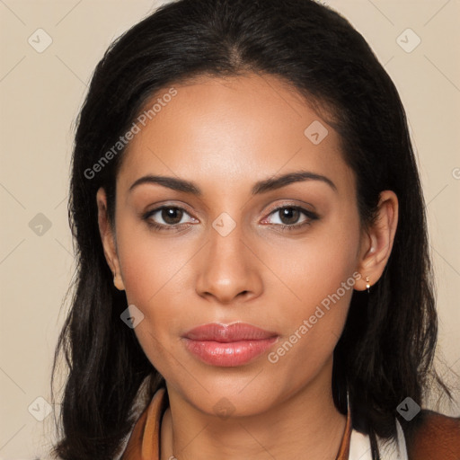 Joyful latino young-adult female with long  brown hair and brown eyes