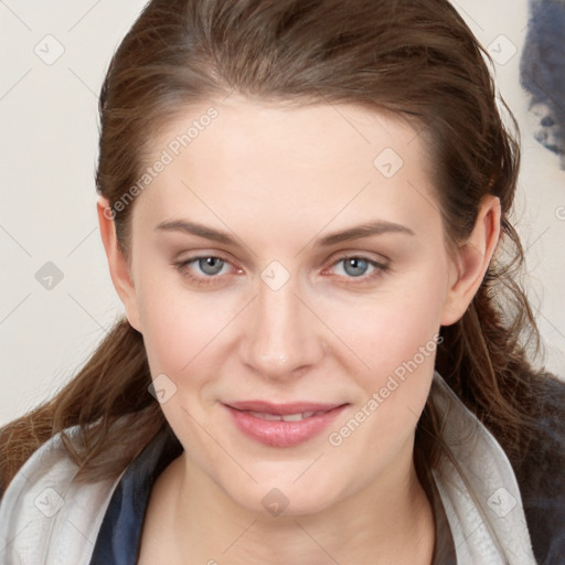 Joyful white young-adult female with medium  brown hair and blue eyes