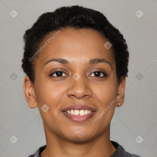 Joyful black young-adult female with short  brown hair and brown eyes